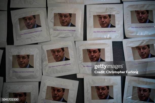 Condoms with a picture of former UKIP leader Nigel Farage are seen for sale during the UKIP annual conference at the International Convention Centre...