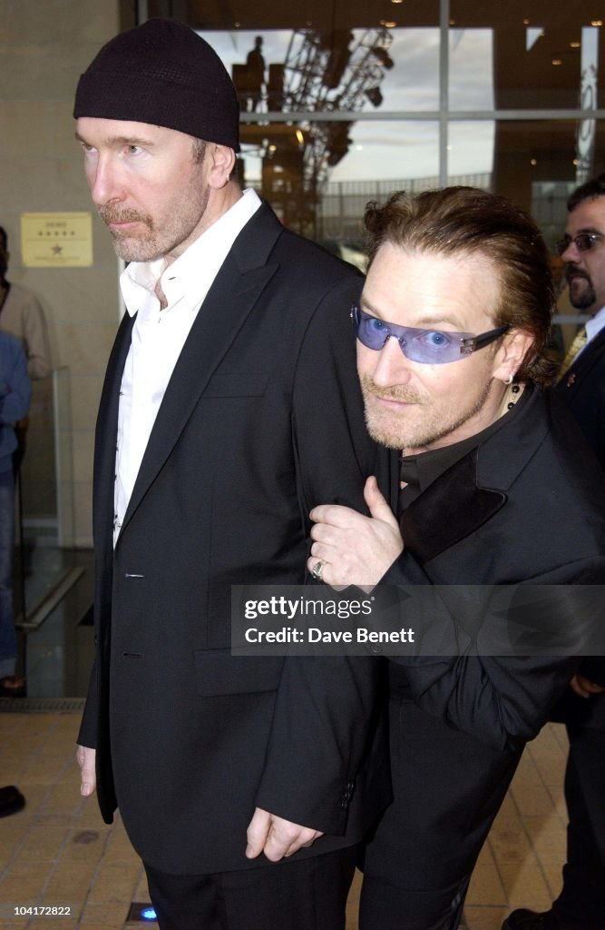 The Edge And Bono From U2 Leave The Sheriton Hotel, The Stars Of Rock And Roll Join Forces For Nelson Mandela's 46664 Concert In Cape Town, South Africa. In The Pre, Concert Build Up, This Evening A Gala Dinner Was Held At The Vergelegen Estate Outside Ca