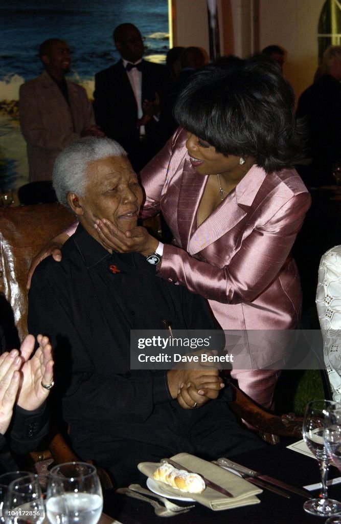 Nelson Mandela Greets Oprah Winfrey, The Stars Of Rock And Roll Join Forces For Nelson Mandela's 46664 Concert In Cape Town, South Africa. In The Pre, Concert Build Up, This Evening A Gala Dinner Was Held At The Vergelegen Estate Outside Cape Town., South