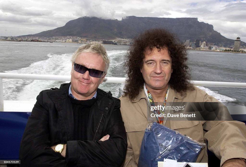 Roger Taylor And Brian May, The Stars Of Rock And Roll Join Forces For Nelson Mandela's 46664 Concert In Cape Town, South Africa. In The Pre, Concert Build Up The Artists And Mr Mandela Travelled To The Prison On Robben Island, Where Mr Mandela Was Impris