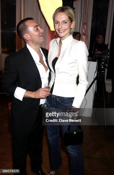 New Givenchy chief designer Julien Macdonald and Saffron Aldridge attend the launch of Givenchy's new range of after shaves and lotions for men with...