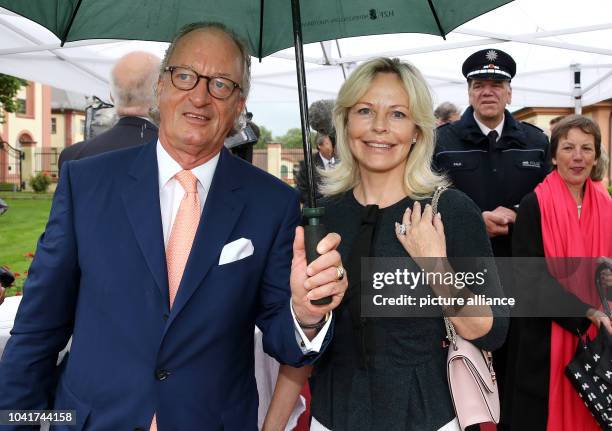 Karl Friedrich Prince of Hohenzollern and his wife Katharina Princess of Hohenzollern posing during a reception on the evening before the 80th...