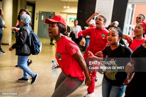 Student wearing clothes from the Economic Freedom Fighters, an opposition political party in South Africa, marches on the WITS University Campus in...