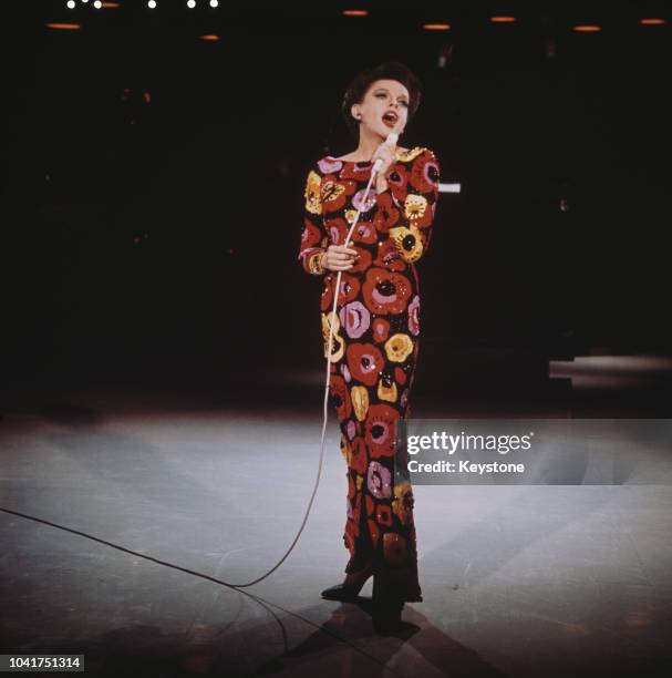 American singer and actress Judy Garland on stage, circa 1960.