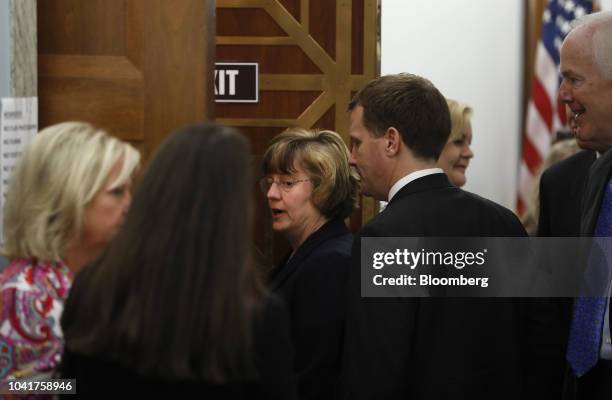 Rachel Mitchell, a Republican prosecutor from Arizona, stands outside the room during a break in a Senate Judiciary Committee hearing in Washington,...