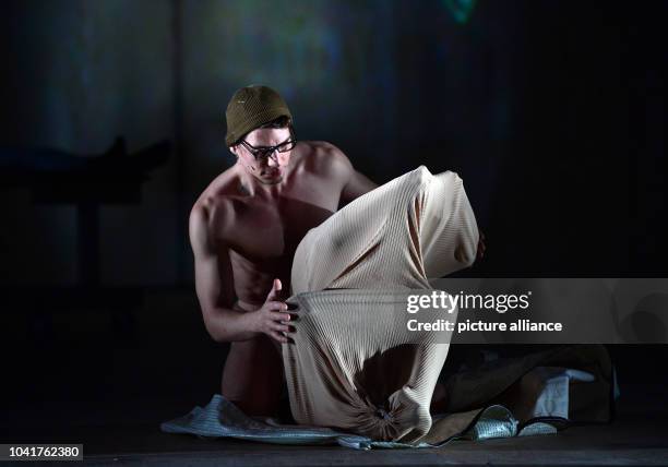 Krunoslav Sebrek as Wagner and Simone Mueller as Homunculus rehearse a scene from 'Faust, Part Two' by Johann Wolfgang von Goethe on stage at the...