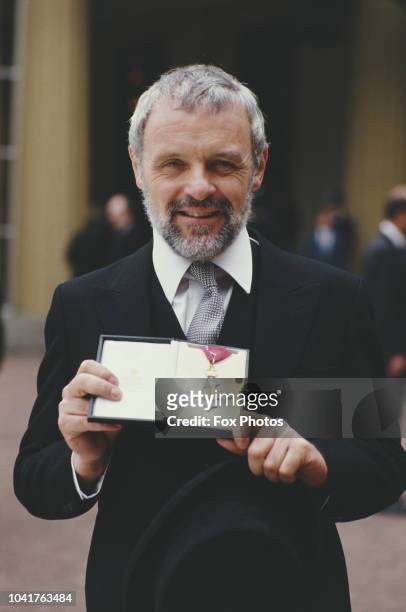 Welsh actor Sir Anthony Hopkins receives a CBE at Buckingham Palace in London, 3rd November 1987.