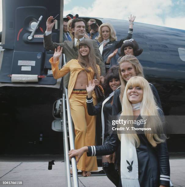 American businessman Hugh Hefner and his girlfriend Barbi Benton arrive at London Airport on board his private jet 'Big Bunny', accompanied by a...