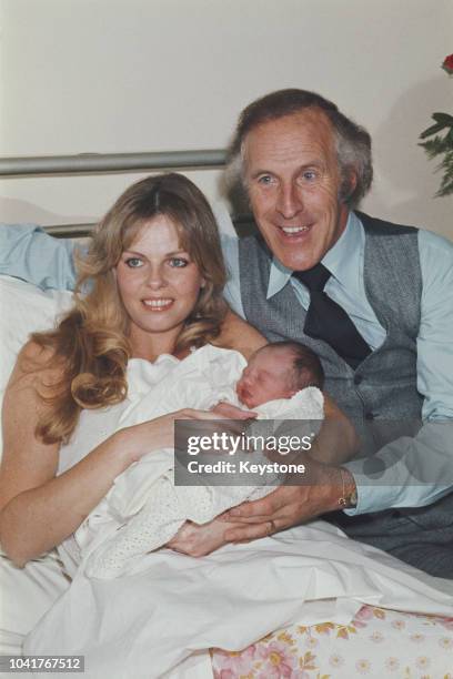 British television presenter Bruce Forsyth with his wife Anthea Redfern and their baby daughter Louisa at the Avenue Clinic, Regent's Park, London,...