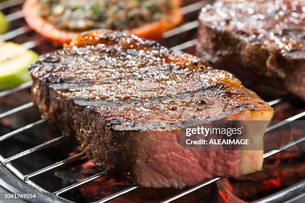 barbecue grill beef steak - tomahawk stock pictures, royalty-free photos & images