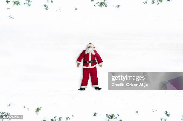 aerial view of santa claus - santa claus lying stock pictures, royalty-free photos & images
