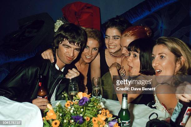 Noel Gallagher, Meg Mathews, guest, Kate Moss, Lisa Moorish and guest attend the launch of Sound Republic in October 1998 in London, England....