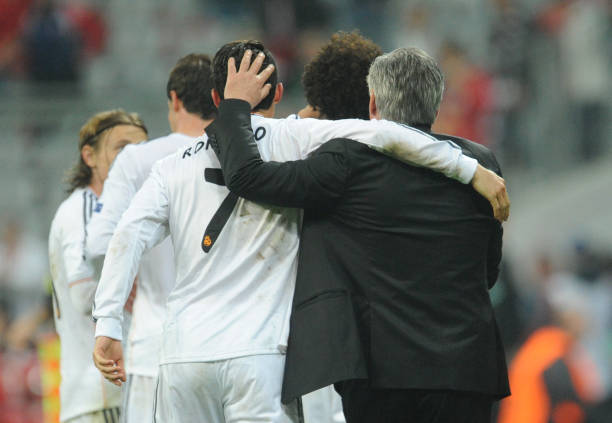 Madrid Cristiano Ronaldo and head coach Carlo Ancelotti celebrate the 4-0 goal during the Champions League semi-final second leg match between FC...