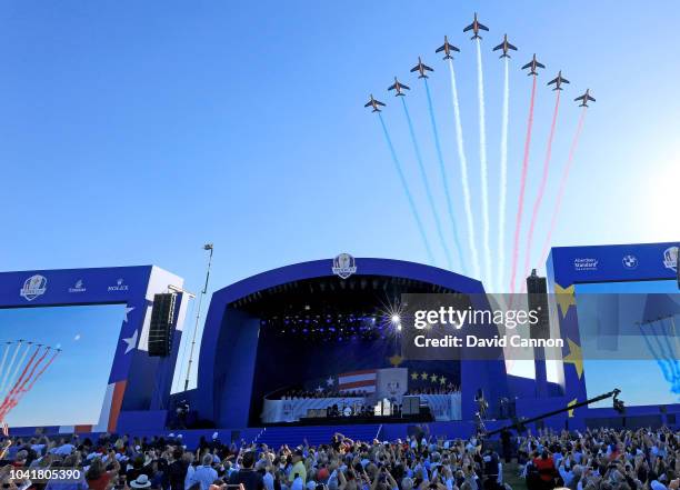 The French Air Force Rafale display team fly over during the opening ceremony for the 2018 Ryder Cup at Le Golf National on September 27, 2018 in...
