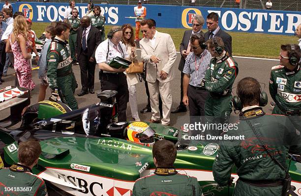 Arnold Schwarzenegger With The Jaguar Team, Celebrities In The Paddock At The British Grand Prix 2003 At Silverstone