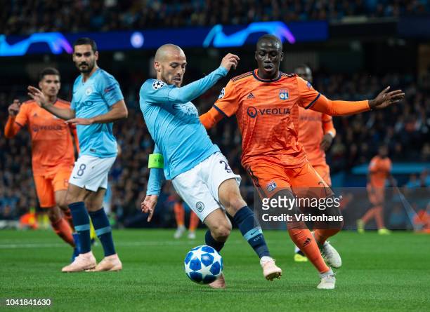 David Silva of Manchester City and Ferland Mendy of Olympique Lyonnais in action during the Group F match of the UEFA Champions League between...