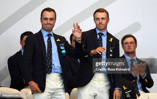 Justin Thomas of the United States and Jordan Spieth of the United States react after being matched against Paul Casey of Europe and Tyrrell Hatton...