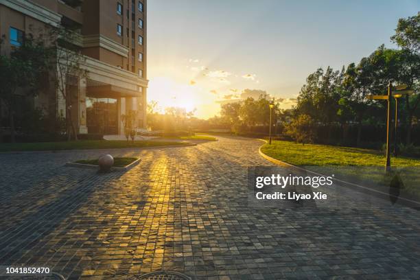 sunset in residential district - suburb park stock pictures, royalty-free photos & images