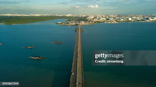 high angle view of road across the ocean - estado de selangor fotografías e imágenes de stock