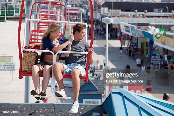 teenage couple on ferris wheel - seaside heights stock pictures, royalty-free photos & images