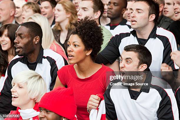 fans watching football match - crowd anticipation stock pictures, royalty-free photos & images