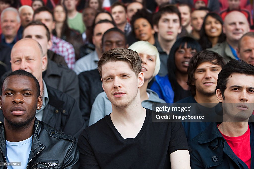 Fans watching football match