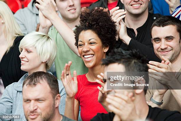 fans at football match - cheering crowd stockfoto's en -beelden