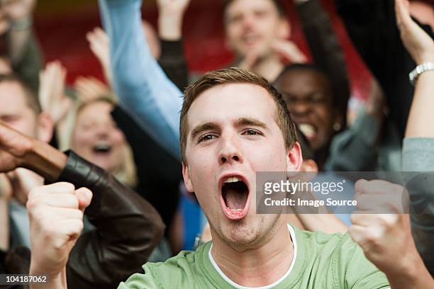 shouting man at football match - cheering crowd in grandstand bildbanksfoton och bilder