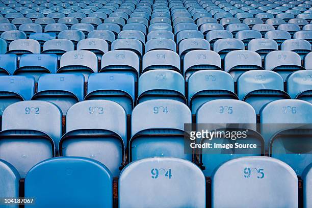 empty seats in football stadium - large group of objects sport stock pictures, royalty-free photos & images