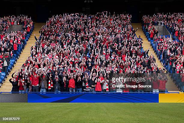 football crowd in stadium - crowd of people stock pictures, royalty-free photos & images