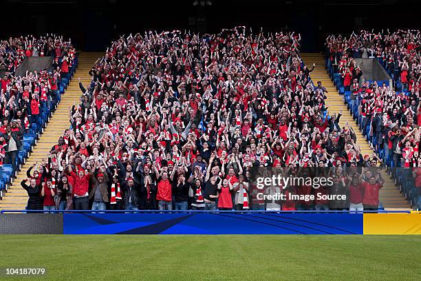 football crowd in stadium - soccer stadium stock pictures, royalty-free photos & images