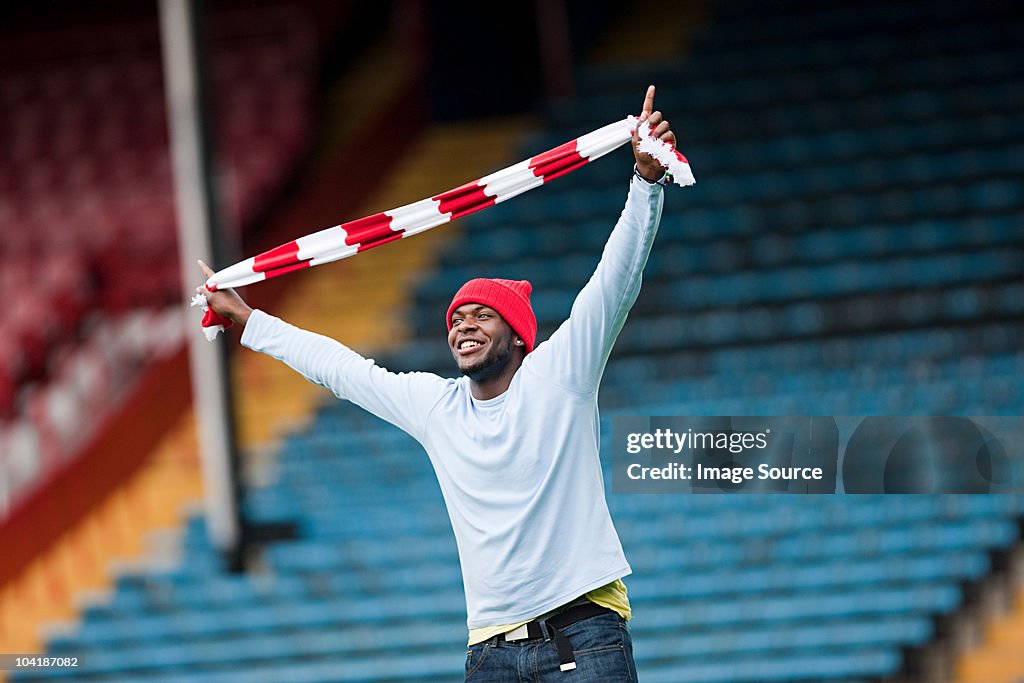 Football fan with scarf