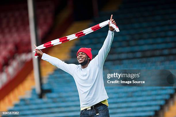 football fan with scarf - soccer fan stock pictures, royalty-free photos & images