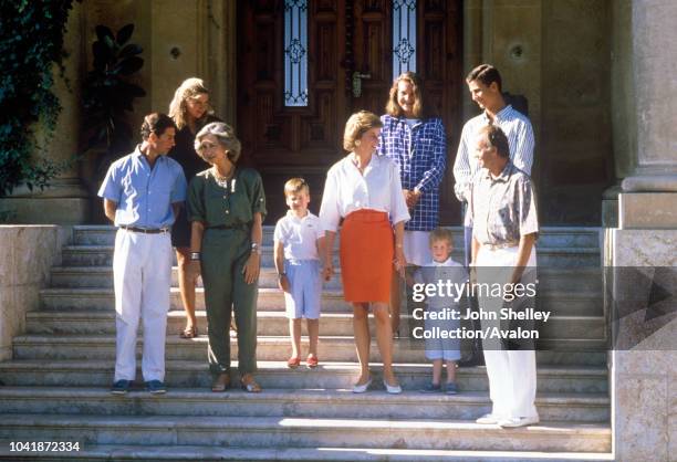 Charles, Prince of Wales, and Diana, Princess of Wales, on holiday in Majorca, Spain, with their sons Prince William and Prince Harry, They are...