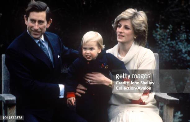 Young Prince William with his parents Prince Charles, Prince of Wales, and Diana, Princess of Wales, in the gardens of Kensington Palace on December...