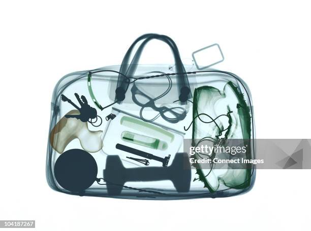 xray image of bag containing sports equipment - xray bag stock pictures, royalty-free photos & images