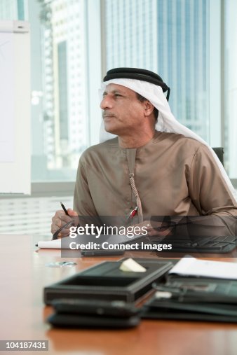 Middle eastern businessman in office Middle eastern businessman in office