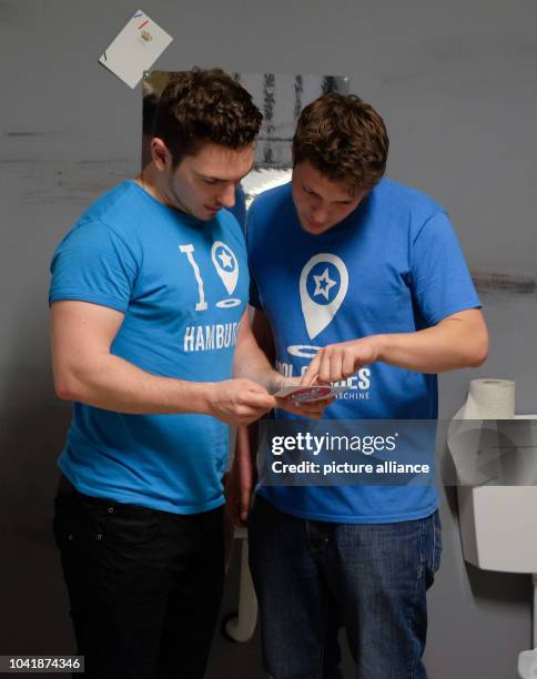 Mirko Oberhof and Yannic Zotzmann from Bochum attempt to solve a puzzle in a Room Escape game in Hamburg, Germany, 8 July 2015. "Exit Games" are a...