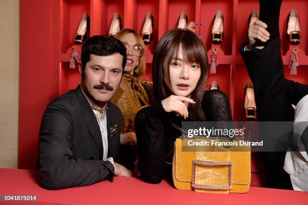 Gherardo Felloni and Qi Wei attend the Roger Vivier Presentation Spring/Summer 2019 during Paris Fashion Week on September 27, 2018 in Paris, France.