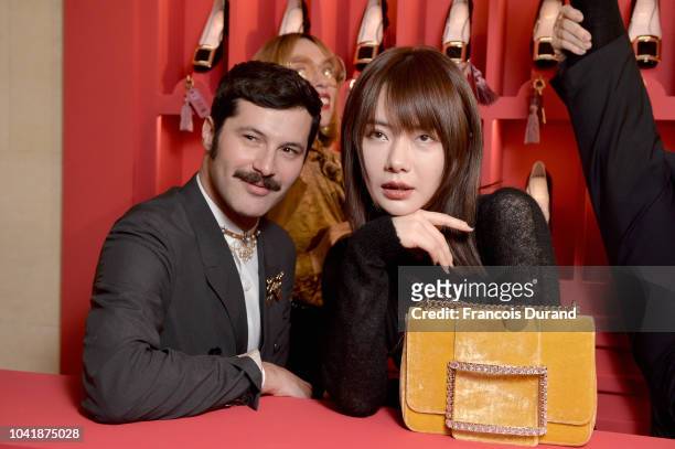 Gherardo Felloni and Qi Wei attend the Roger Vivier Presentation Spring/Summer 2019 during Paris Fashion Week on September 27, 2018 in Paris, France.
