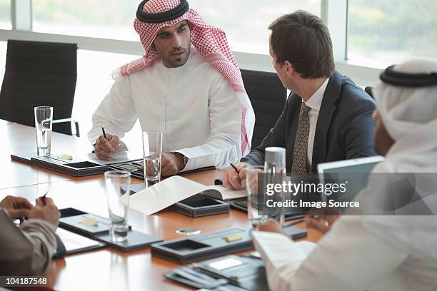 businessmen in a meeting - middle eastern culture stock pictures, royalty-free photos & images