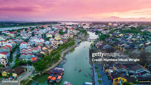june 2017 hoi an, vietnam - the main river thoroughfare on the thu bon river in hoi an at sunset. - hoi an stockfoto's en -beelden