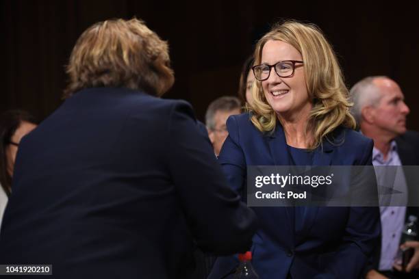 Christine Blasey Ford , shakes hands with Rachel Mitchell, a prosecutor from Arizona, after she testified before the US Senate Judiciary Committee in...