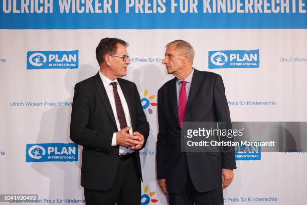 Federal Minister for Economic Cooperation and Development Gerd Mueller and Ulrich Wickert attend the Ulrich Wickert and Peter Scholl-Latour award at...