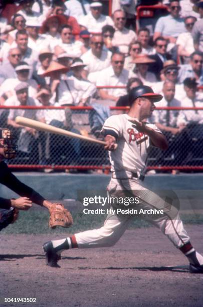 Eddie Mathews of the Milwaukee Braves swings at the pitch during an MLB game against the Pittsburgh Pirates on July 4, 1960 at Milwaukee County...