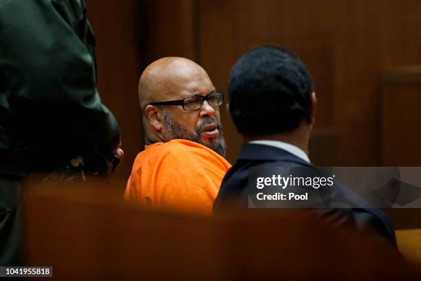 Marion "Suge" Knight, left, shown with his attorney Albert DeBlanc, appears in court pleading no contest to voluntary manslaughter in front of Judge...