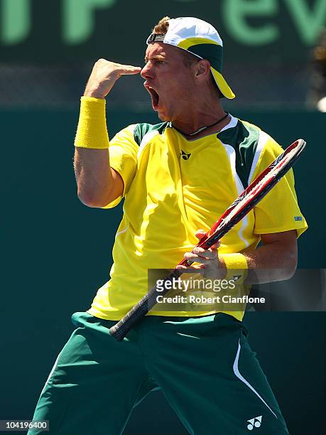 Lleyton Hewitt of Australia celebrates his second set win against Ruben Bemelmans of Belgium during day one of the Davis Cup tie between Australia...