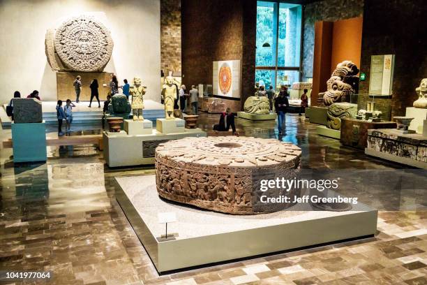 Cuauhxicalli of Motecuhzoma Moctezuma stone sculptures inside the National Museum of Anthropology.