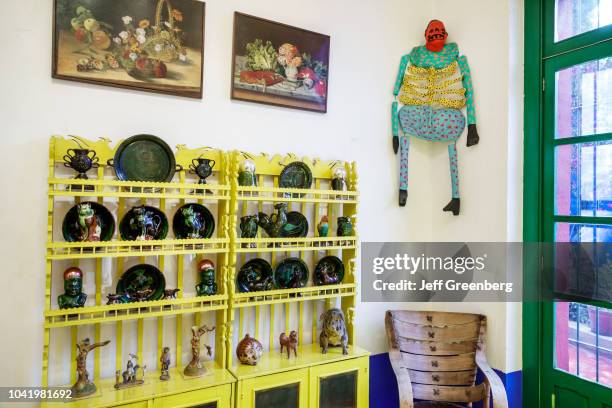 Folk art collection inside the blue house at the Frida Kahlo Museum.