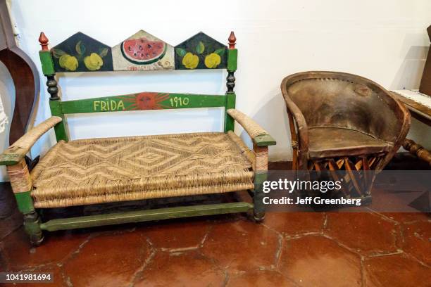 Rustic bench inside the blue house at the Frida Kahlo Museum.